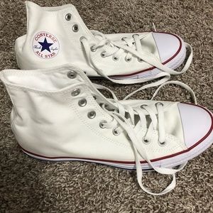 Size 10 white Chuck Taylor’s never worn